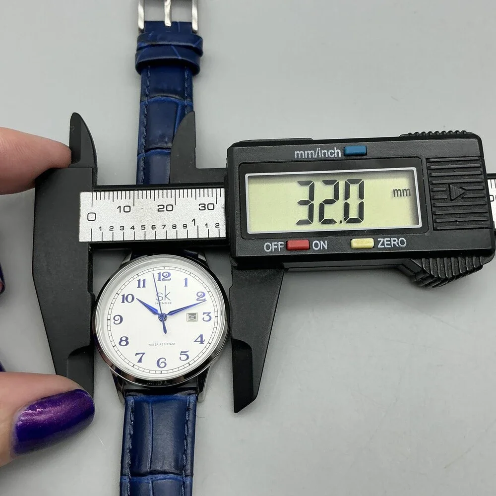 Shengke Womens Watch 32mm Silver Tone Blue Leather Band Date New Battery